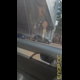Miss Marilyn sits in a car and pulls her shirt up. No pooping shown. Presented in 720P vertical HD format. About half a minute.